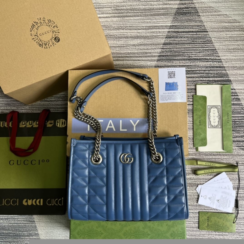 G*u*i shopping bags